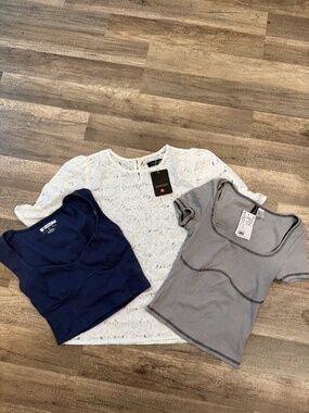 Lot of three size small short sleeve shirts